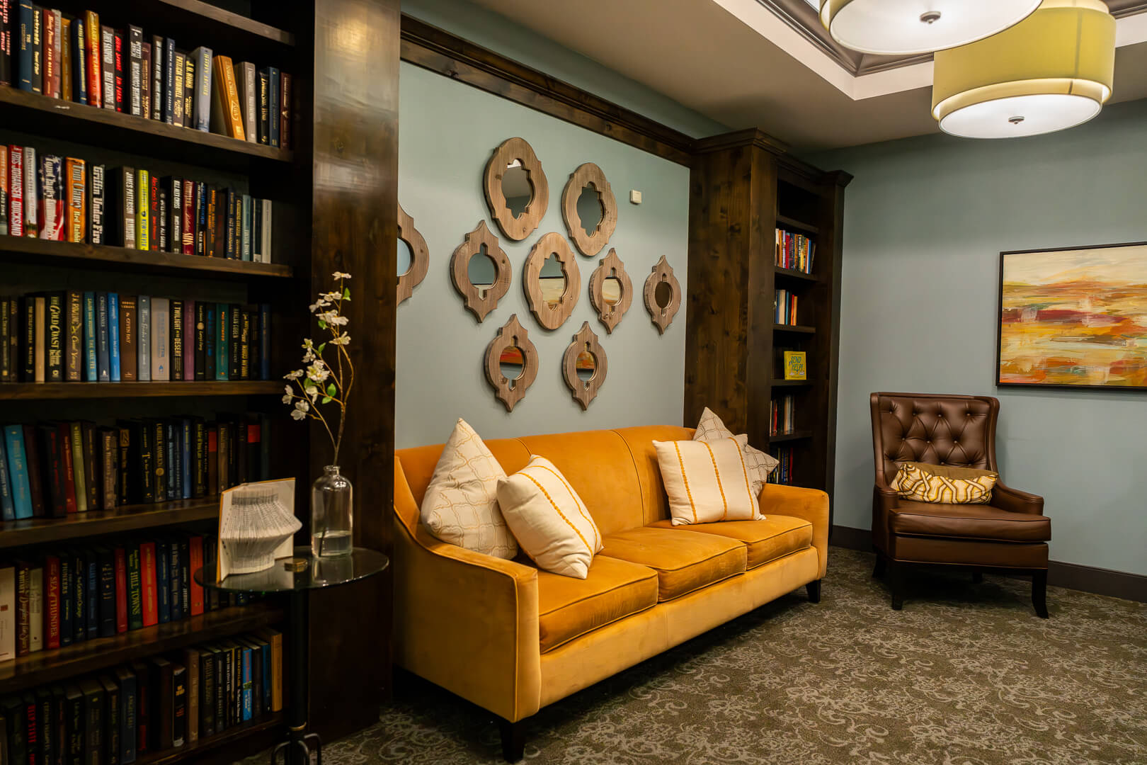 Comfortable Library Reading Area With Books at Memory Care Nursing Homes